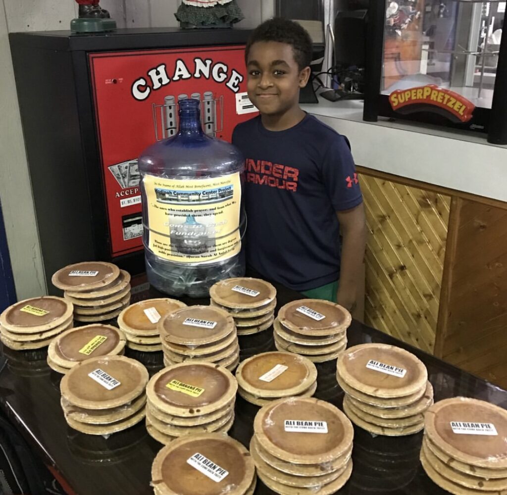 Youth fundraiser selling bean pies for community center